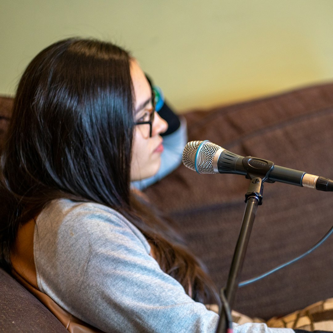 Professional female radio host with headphones