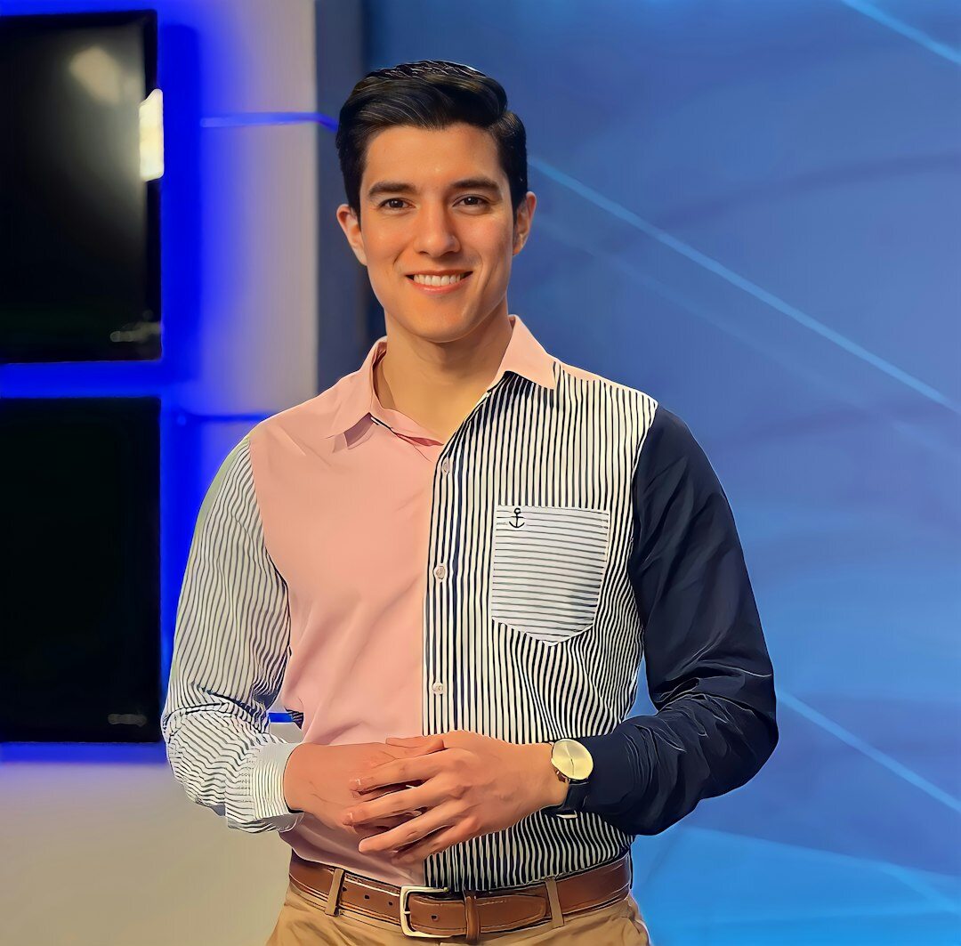 Professional male radio host smiling