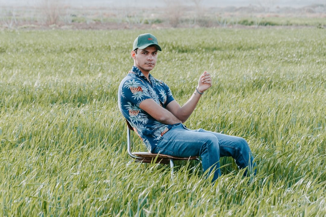 journalist writing notes in field