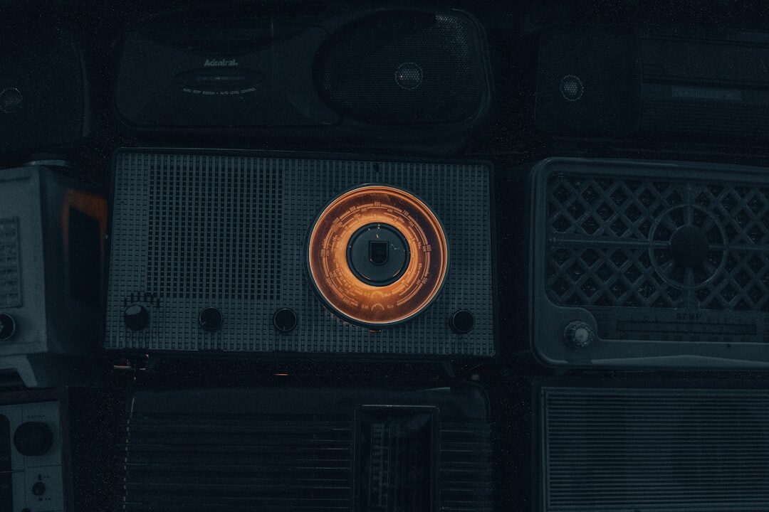 people gathered around radio